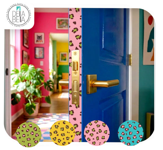 Blue internal door featuring a pink and green maximalist leopard print peel and stick door detail strip by Della Bella.