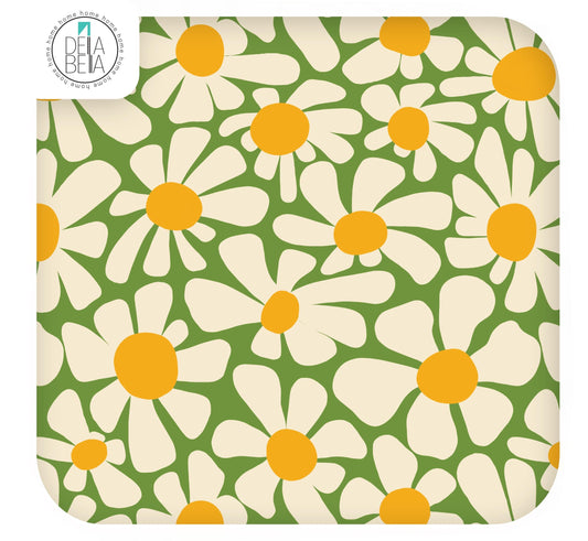 A sheet of self-adhesive vinyl with a floral pattern consisting of large daisies in yellow and green colors.