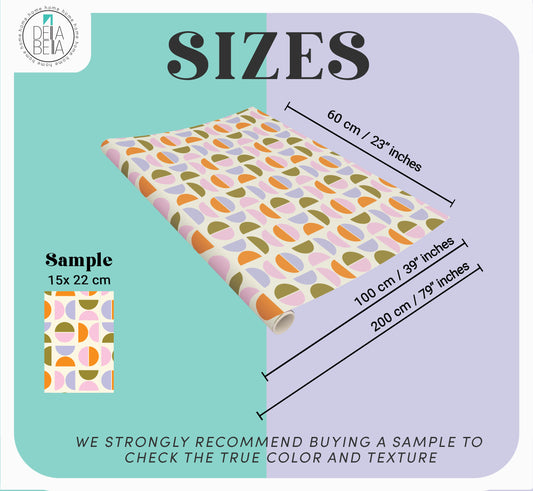 Fabric with colorful geometric pattern and size measurements on a light blue background