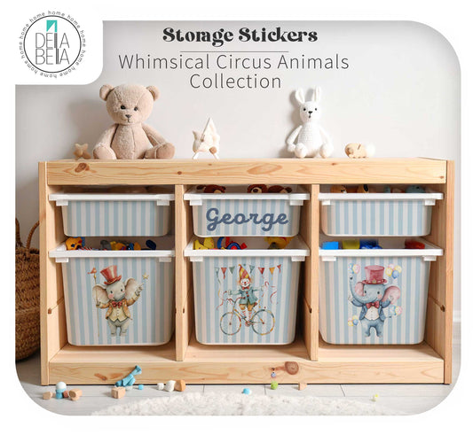 A custom trofast toy organizer cabinet with six striped storage bins decorated with whimsical circus animal illustrations, shown in a styled nursery setting with toys and plush toys on top. Text overlay reads 'Storage Stickers Whimsical Circus Animals Collection' with a Delta Bella logo.