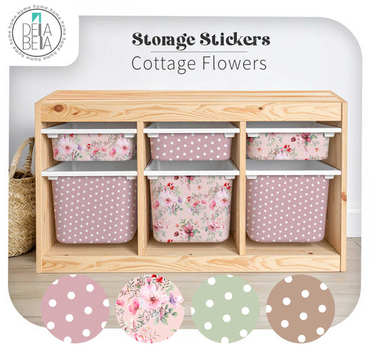 Wooden storage unit with floral and polka dot patterned bins, featuring Delia Bella branding.