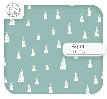 ikea trofast sticker  with white tree patterns on a light blue background, featuring the brand 'Delta Bela'.