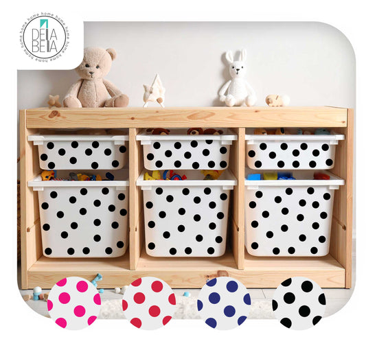 A Trofast storage cabinet with six white bins covered in black polka dots, styled with stuffed toys on top. Four circular color-option overlays appear along the bottom showing pink, red, blue, and black polka dot patterns.