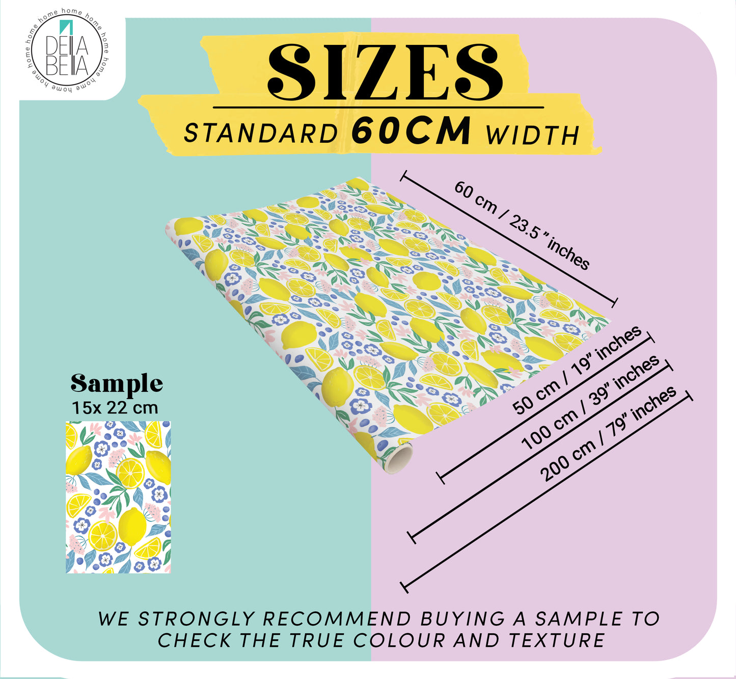 Fabric roll with lemon pattern and size measurement chart on a colorful background
